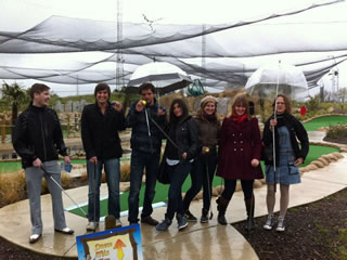Team Binions braves the weather to play minigolf